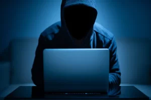 Hacker using a laptop