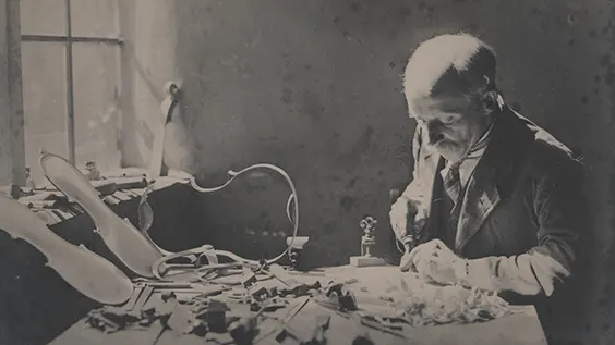 Alfred J Loughton making a violin